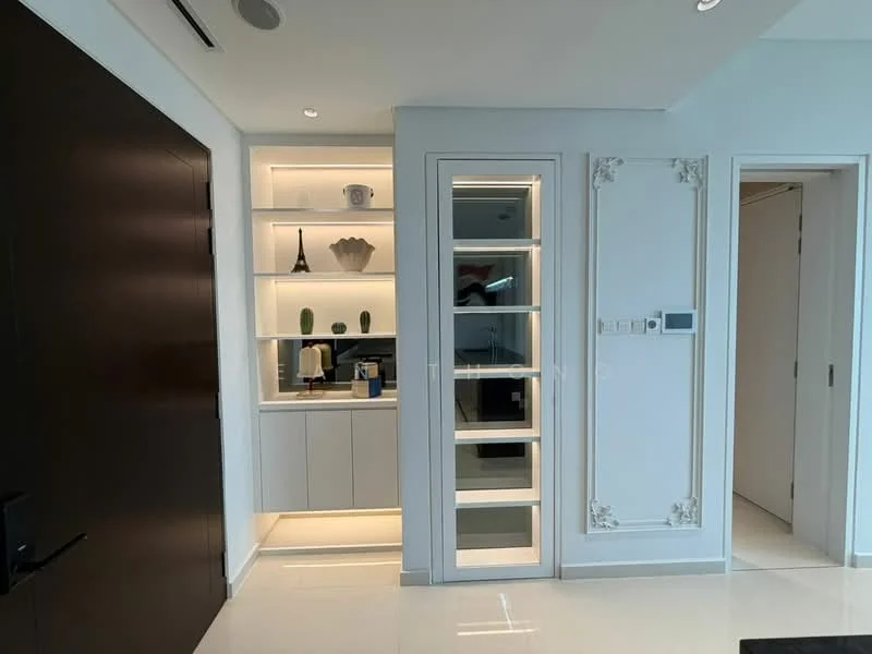 Room features: white painted walls, built-in cabinetry with open shelving, decorative wall paneling, recessed lighting, floor-to-ceiling mirror, light-colored flooring, wall-mounted thermostat, decorative items on shelves; style: modern.