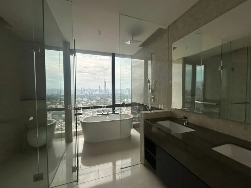 Bathroom features: freestanding bathtub, glass shower enclosure, double-sink vanity with dark cabinetry, chrome basin mixers, large wall mirror, stone wall cladding, white tiled flooring, floor-to-ceiling windows with city view, toilet, recessed downlights; style: modern; view: city.