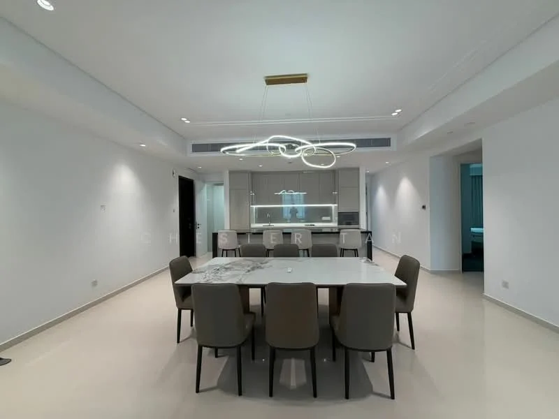 Dining features: 6-seater dining table with marble top, upholstered dining chairs in beige, modern pendant light fixture, white painted walls, light-colored flooring, open layout to kitchen, recessed ceiling lights, floor-to-ceiling windows in background; style: modern. Kitchen features: kitchen island with seating, stainless-steel appliances, white cabinetry, glass backsplash, built-in oven, refrigerator, cooktop, under-cabinet lighting; style: modern.