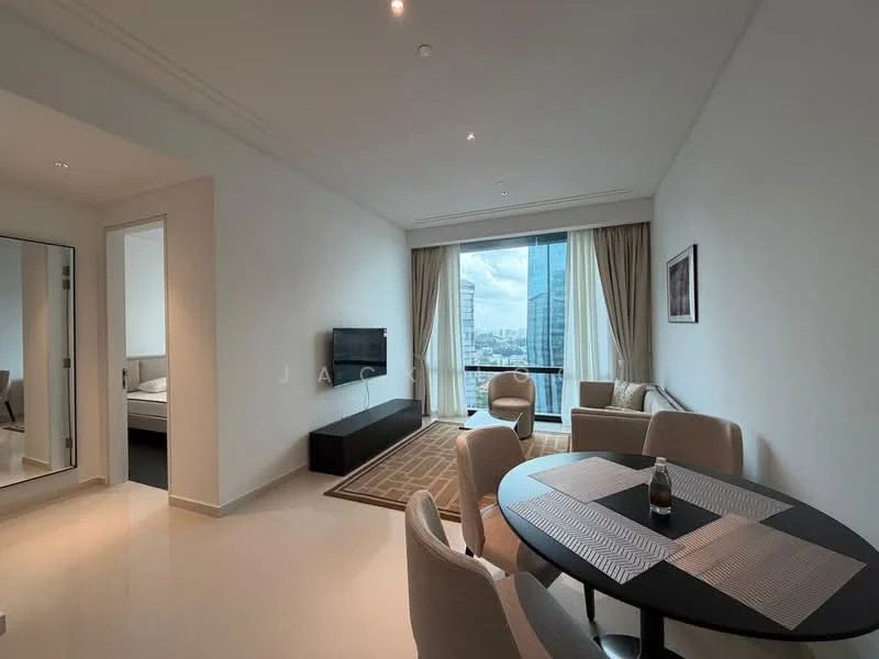 Living features: light-coloured walls, polished tile flooring, recessed downlights, floor-to-ceiling windows, curtains, wall-mounted TV, black TV console, round dining table, upholstered dining chairs, area rug with geometric pattern, sofa, decorative artwork; style: modern; view: city. Room features: light-coloured walls, polished tile flooring.