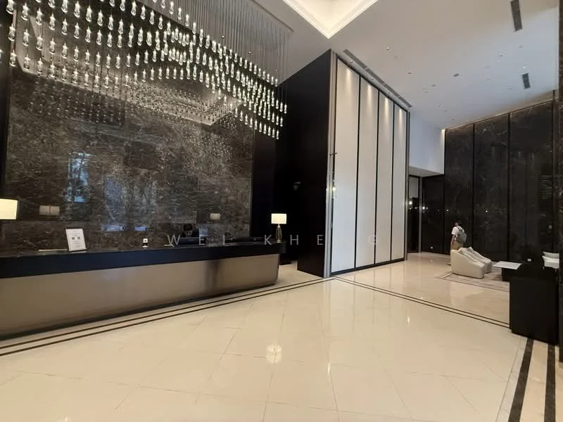 Room features: marble flooring, black stone feature wall, chandelier lighting, reception desk, floor-to-ceiling windows, high ceiling, modern decor, white walls, black accent wall, seating area with armchairs; style: modern.