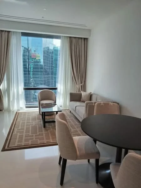Living features: floor-to-ceiling windows, sheer curtains, beige fabric sofa, coffee table, area rug with geometric pattern, 4 upholstered dining chairs, round dining table, white painted walls, polished tile flooring, city view; style: modern; view: city.