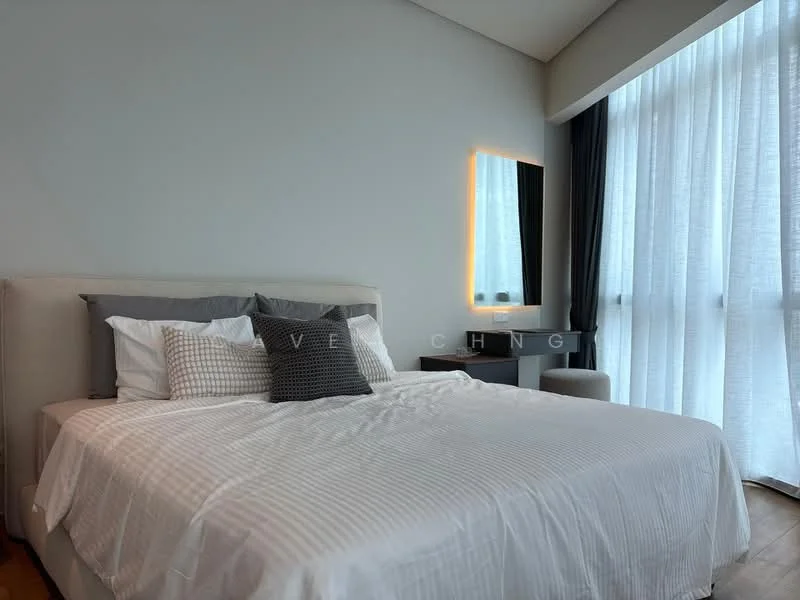 Bedroom features: king-size bed with upholstered headboard, white bedding with striped pattern, decorative throw pillows, nightstand with lamp, floor-to-ceiling windows with sheer curtains, wooden flooring, wall-mounted mirror with LED lighting, grey accent wall; style: modern.