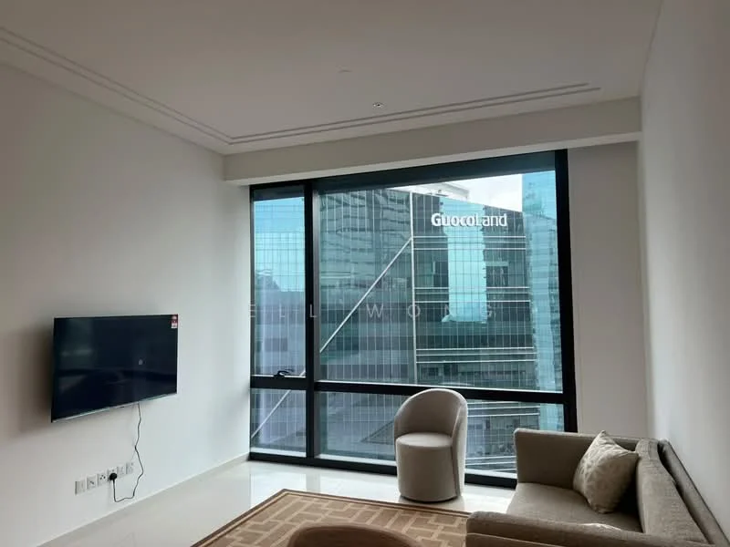 Living features: floor-to-ceiling windows, white painted walls, recessed downlights, cream sofa, round accent chair, TV mounted on wall, area rug with geometric pattern, marble flooring; style: modern; view: city.