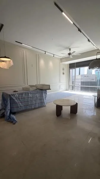 Living features: white painted walls, marble flooring, 5-blade ceiling fan, recessed downlights, large sliding glass door, floor-to-ceiling windows, decorative wall paneling, round coffee table, sofa covered with fabric, curtains, natural light from windows; style: modern; view: city.