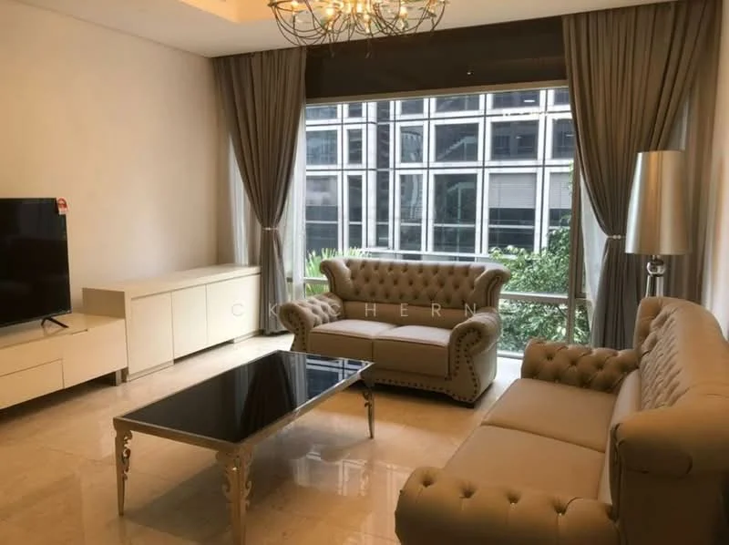 Living features: beige tufted fabric sofa, 2-seater tufted sofa, glass coffee table with silver legs, white TV console, wall-mounted TV, floor-to-ceiling windows, grey curtains, chandelier with multiple bulbs, marble flooring, decorative plants visible through windows; style: modern; view: garden.