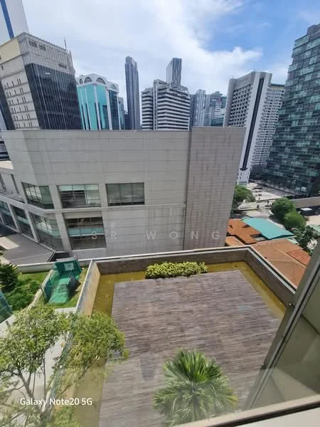 Exterior type: high-rise condominium; features: glass curtain wall, concrete facade, rooftop garden, landscaped terrace, surrounded by city skyline, mature trees, manicured lawn; style: modern.