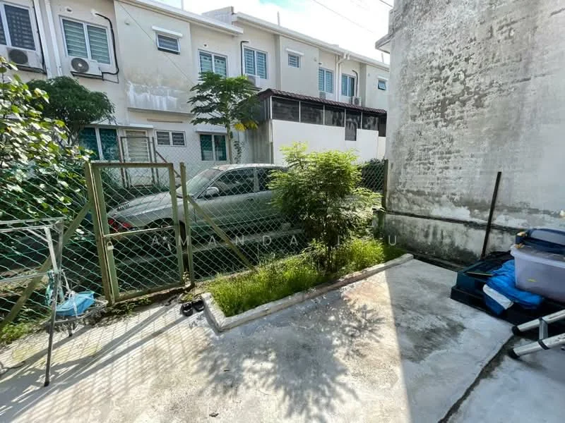 Exterior type: linked terrace house; features: concrete flooring, fenced yard, small garden area with grass, mature shrubbery, parking space for one car, adjacent residential buildings, visible air conditioning units on buildings; style: modern.