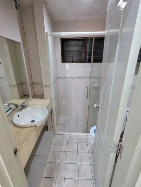 Bathroom features: single-sink vanity with beige countertop, chrome basin mixer faucet, framed mirror above sink, shower area with glass door, toilet, white tiled walls, beige tiled flooring, window for natural light.
