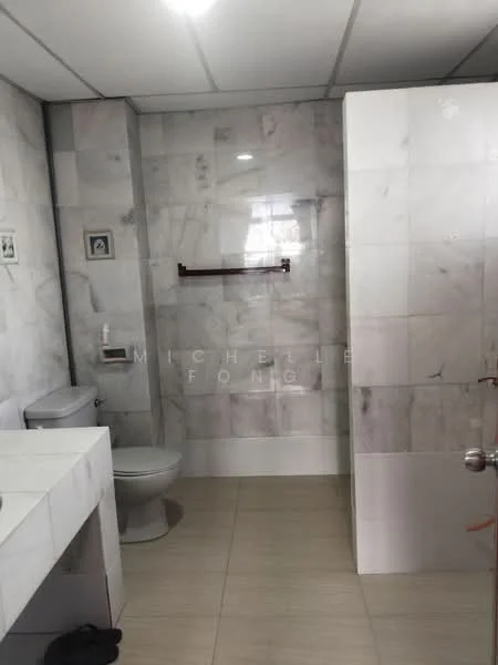 Bathroom features: white ceramic toilet, walk-in shower with glass enclosure, chrome basin mixer faucet, single-sink vanity with marble countertop, mirror above vanity, grey marble wall tiles, light beige floor tiles, towel rack, wall-mounted soap dispenser; style: modern.