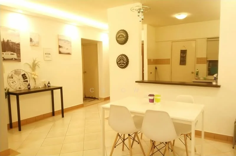 Dining features: white dining table, 4 white plastic dining chairs, cream tiled flooring, wall-mounted light fixture, decorative wall art, black console table, open kitchen counter, neutral wall color; style: modern. Room features: cream painted walls, doorway leading to another room, mirror on wall, kitchen area visible in background.