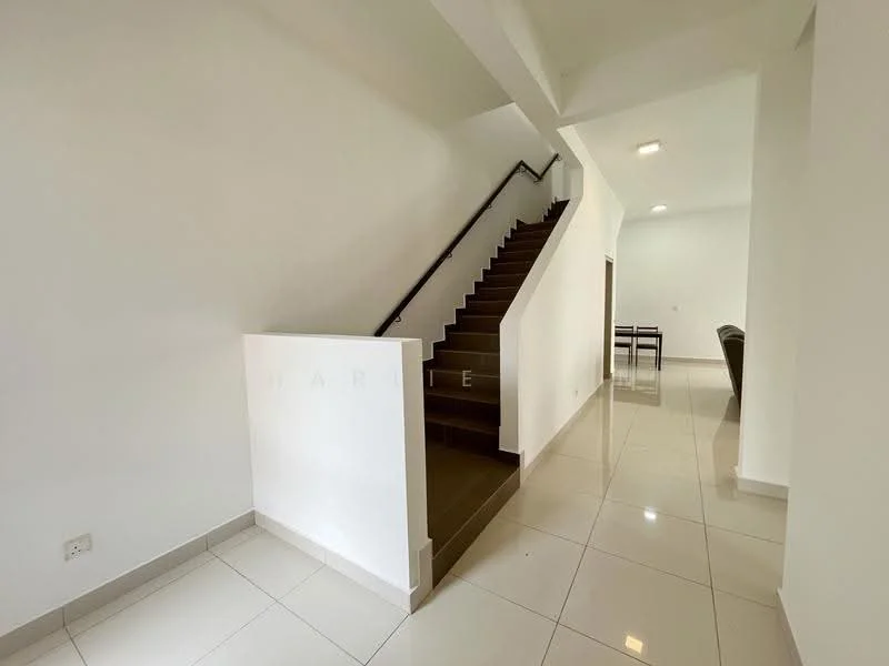 Room features: white painted walls, glossy ceramic tile flooring, staircase with dark wood steps, metal handrail, recessed ceiling lights, open layout, neutral decor, natural light from windows; style: modern.