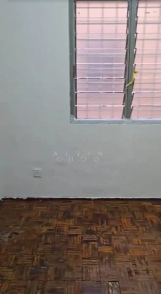 Room features: white painted walls, wooden flooring, window with metal grille.