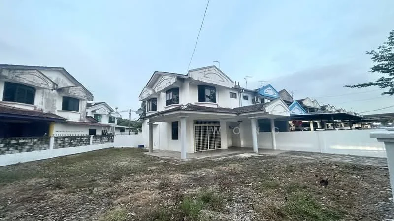 Exterior type: semi-detached house; features: two-storey structure, white painted facade, gabled roof, front porch, exposed brick wall, manicured lawn area, surrounding fence, driveway, multiple windows, air conditioning unit visible, adjacent houses visible, open space in front; style: traditional.