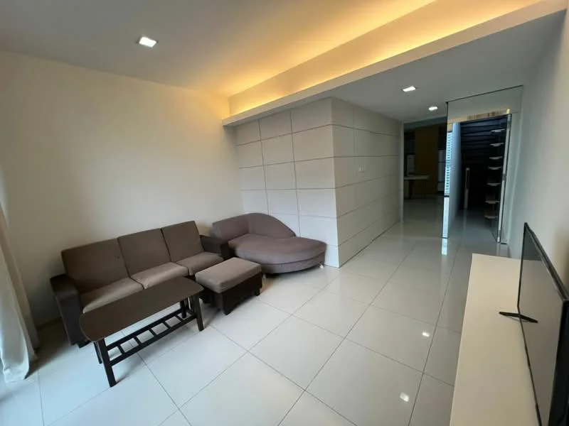 Living features: 3-seater fabric sofa in brown, single armchair in brown, coffee table, TV console, wall-mounted TV, white painted walls, recessed LED downlights, glossy tile flooring, floor-to-ceiling windows with sheer curtains, built-in wall paneling, open layout to kitchen, neutral color palette; style: modern.