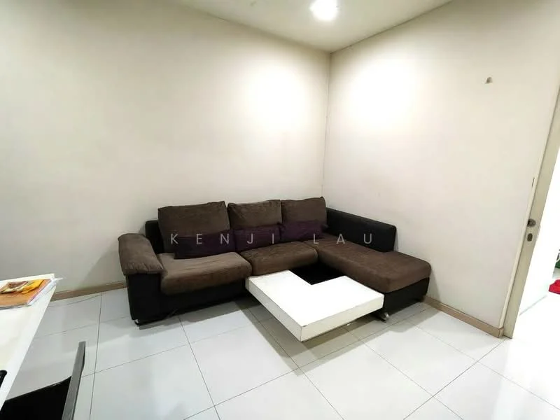 Living features: L-shape sectional sofa in brown fabric, white coffee table, white tiled flooring, plain white walls, recessed downlights, no visible decor, no visible windows, corner layout; style: modern.