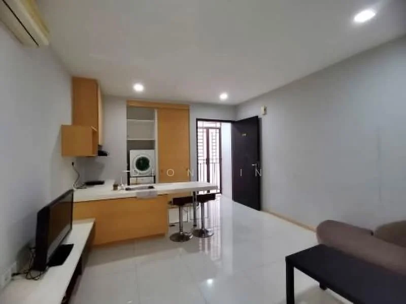 Living features: white painted walls, glossy tile flooring, wall-mounted TV, wooden TV console, 2 high stools, small dining table, built-in cabinetry, washing machine, air conditioning unit, recessed LED downlights, main entrance door; style: modern.