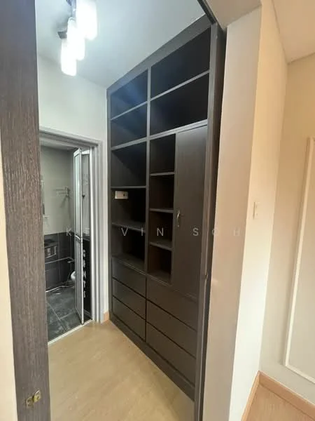 Room features: built-in wardrobe with shelves, dark wood cabinetry, multiple storage compartments, light-colored walls, laminate flooring, recessed ceiling lights, doorway leading to bathroom, neutral color scheme; style: modern.