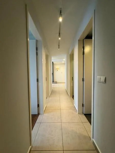 Hallway features: white painted walls, tile flooring, recessed ceiling lights, multiple doorways, neutral color scheme, straight corridor layout; style: modern.