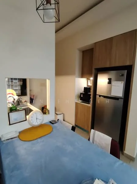 Kitchen features: blue tablecloth on dining table, wooden cabinetry, stainless-steel fridge, built-in kitchen appliances, white walls, pendant light fixture, open layout, clock on table; style: modern.