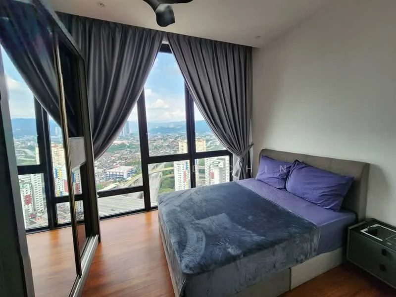 Bedroom features: king-size bed with grey upholstered headboard, purple bedding, floor-to-ceiling windows, city view, dark wood flooring, grey curtains, side table, wall-mounted mirror, ceiling fan; style: modern; view: city.