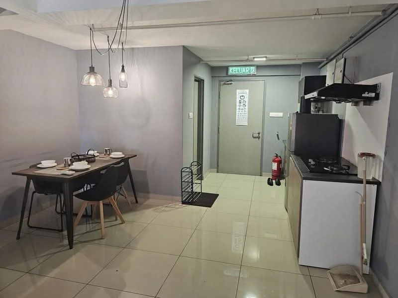 Kitchen features: grey painted walls, glossy tile flooring, dining table with 4 black chairs, pendant lighting above dining table, stainless-steel gas hob, black range hood, white cabinetry, black countertop, fire extinguisher, door leading to hallway, open shelving, kitchen sink; style: modern.