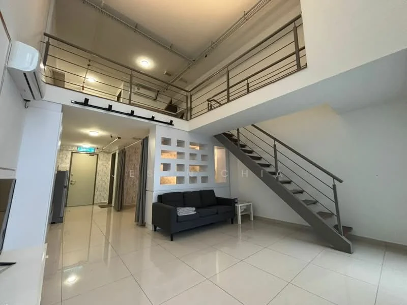 Living features: white painted walls, glossy tile flooring, sofa in dark grey, metal railing on upper level, staircase with metal handrail, recessed ceiling lights, air conditioning unit, decorative wall with cut-out patterns; style: modern. Room features: open space, high ceiling, natural light from upper level.