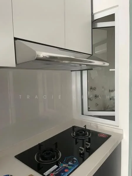 Kitchen features: white cabinetry, black glass cooktop with two burners, stainless-steel range hood, white tiled backsplash, window with view to outside, countertop with smooth surface, built-in cabinetry, modern design; style: modern.