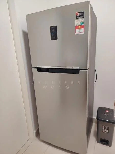 Room features: stainless-steel fridge, top freezer, black handle, digital control panel, visible trash bin.