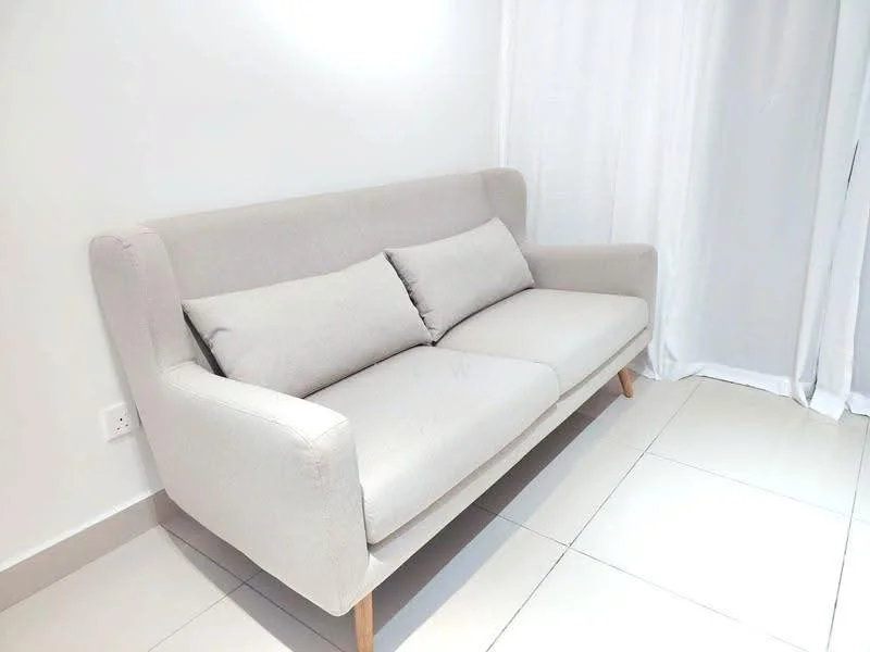 Living features: light grey fabric 3-seater sofa, wooden legs, two matching cushions, white walls, cream tiled flooring, floor-to-ceiling curtains, natural light from window; style: modern.