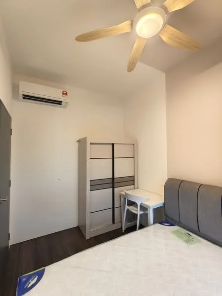 Bedroom features: queen-size bed, upholstered headboard, 5-blade ceiling fan with light, wall-mounted split AC, built-in wardrobe with multiple drawers, study desk, chair, dark wood flooring, white painted walls; style: modern.