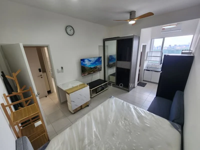 Bedroom features: queen-size bed with white bedding, sofa in dark grey fabric, wall-mounted TV, ceiling fan with light, floor-to-ceiling windows, white painted walls, tile flooring, built-in wardrobe with sliding doors, small dining table, kitchenette area with sink, clock on the wall, open shelving unit, coat rack, air conditioning unit; style: modern; view: city.