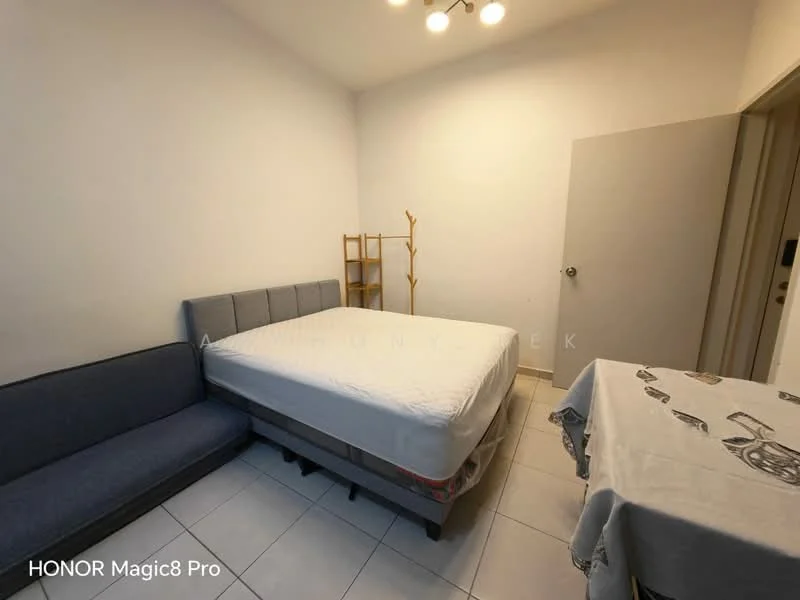Bedroom features: queen-size bed, upholstered headboard, sofa in grey fabric, wooden shelving unit, dining table with tablecloth, white painted walls, tile flooring, ceiling lights; style: modern.
