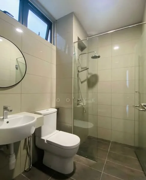 Bathroom features: white ceramic toilet, single-sink vanity with chrome faucet, round mirror, glass shower enclosure, rain shower head, wall-mounted shower controls, grey tile flooring, beige wall tiles, recessed lighting; style: modern.