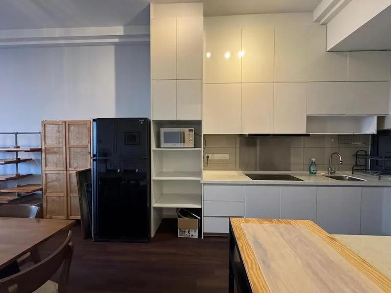 Kitchen features: white cabinetry, black refrigerator, built-in microwave, single-bowl stainless-steel sink, chrome pull-down faucet, grey countertop, tile backsplash, open shelving, wooden dining table, wooden chairs, dark wood flooring; style: modern.