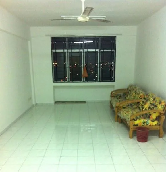 Living features: white painted walls, glossy white tile flooring, 5-blade ceiling fan, large windows with black frames, two 3-seater sofas with floral upholstery, wooden coffee table, decorative lamp on window sill, empty space, city view from windows; view: city.