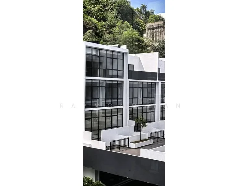 Exterior type: low-rise apartment block; features: white painted facade, large floor-to-ceiling windows, balconies with glass railings, manicured landscaping, concrete walkways, multiple levels, surrounded by greenery; style: modern.
