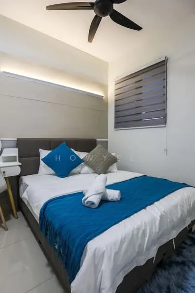 Bedroom features: queen-size bed, upholstered headboard, white bedding, blue throw blanket, two white towels, ceiling fan, roller blinds, decorative pillows, nightstand with drawer, laminate flooring, wall-mounted light fixture, accent wall with paneling; style: modern.