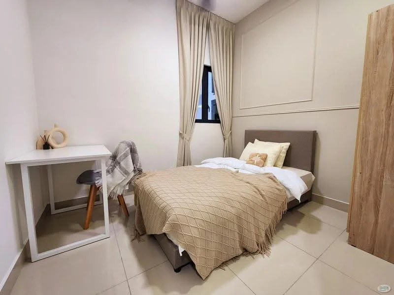Bedroom features: queen-size bed with beige throw blanket, upholstered headboard, white bedding, wooden bedside table, white desk with wooden legs, grey upholstered chair, decorative wall paneling, cream painted walls, floor-to-ceiling window with sheer curtains, tile flooring; style: modern.