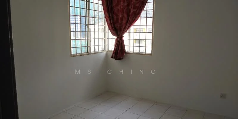 Room features: white painted walls, tile flooring, large windows with metal grills, red curtains, corner room layout.