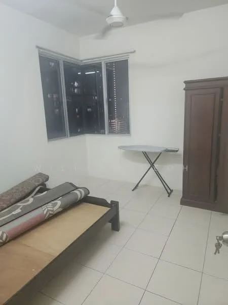 Bedroom features: white painted walls, tile flooring, ceiling fan, large window with blinds, wooden wardrobe, folding table, bed frame without mattress, rolled-up carpets.