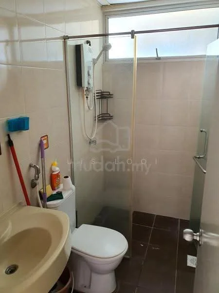 Bathroom features: single-sink vanity with beige countertop, chrome basin mixer faucet, one-piece toilet, walk-in shower with glass enclosure, rain shower head, tile cladding on walls, dark ceramic tile flooring, shower caddy with multiple hooks, soap dispenser, toilet paper holder; style: modern.