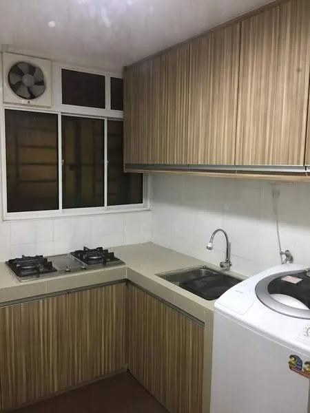 Kitchen features: laminate cabinetry with wood grain finish, white countertop, single-bowl stainless-steel sink, chrome pull-down faucet, 2-burner gas hob, exhaust fan, washing machine, window with grid pattern, white tiled backsplash, flooring in brown tiles; style: modern.
