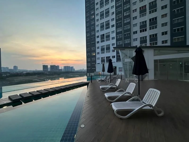 Exterior type: high-rise condominium; features: infinity pool, pool deck with loungers, glass railing, wooden decking, sunset view, surrounding urban landscape, tall residential building, outdoor umbrellas; style: modern.