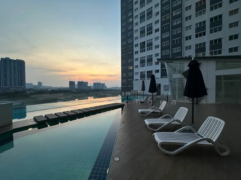 Exterior type: high-rise condominium; features: infinity pool, pool deck with loungers, glass railing, wooden decking, sunset view, surrounding city skyline, umbrella shades, tiled pool edge; style: modern.