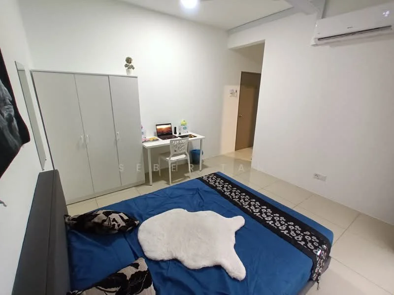 Bedroom features: queen-size bed with blue bedding, white faux fur throw, black and white decorative pillows, built-in wardrobe with sliding doors, study desk with chair, laptop on desk, wall-mounted air conditioning unit, cream painted walls, tile flooring, window with no visible treatment; style: modern.