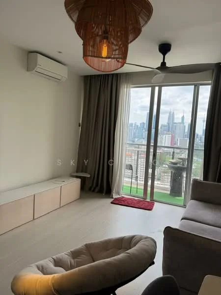 Living features: floor-to-ceiling windows, city skyline view, light wood flooring, white painted walls, 5-blade ceiling fan, wall-mounted split AC, curtains, sofa in light grey, coffee table, decorative rug, built-in TV console; style: modern.