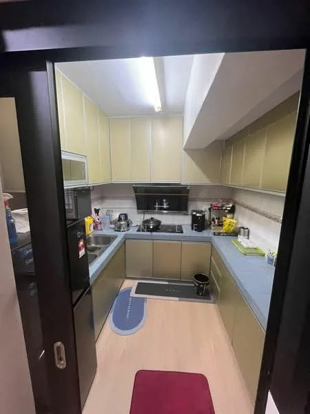Kitchen features: grey laminate countertops, light green cabinetry, stainless-steel sink, chrome pull-down faucet, built-in stove, black microwave, black coffee machine, black kettle, refrigerator, tile backsplash, wood-look vinyl flooring, overhead fluorescent lighting, kitchen mat, wall-mounted cabinets; style: modern.