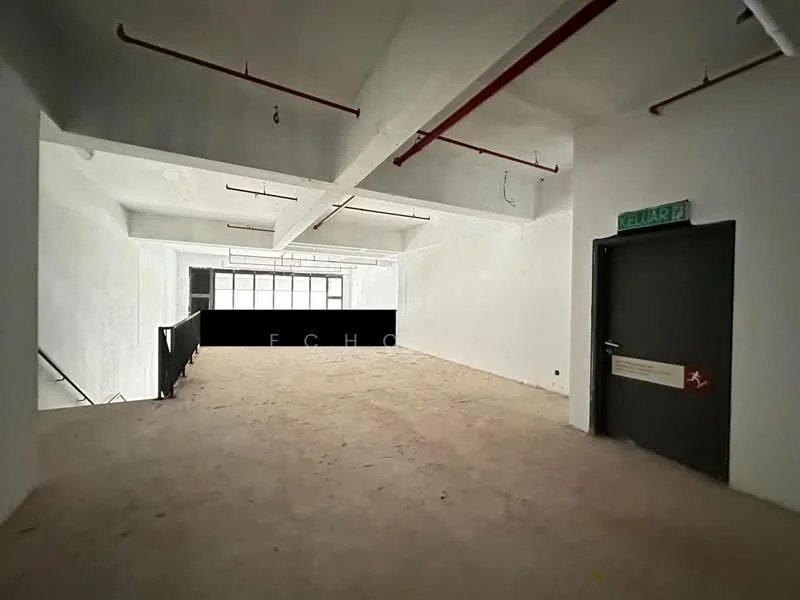 Room features: unfinished concrete flooring, white painted walls, exposed ceiling with pipes, large windows allowing natural light, open space layout, no visible fixtures or furniture; style: industrial.