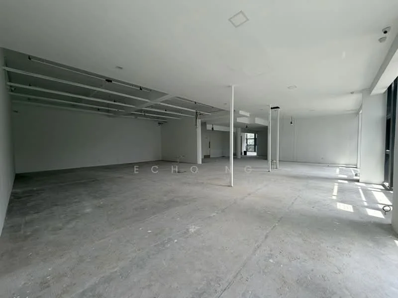 Room features: concrete flooring, white painted walls, exposed ceiling with beams, large windows, open layout, neutral color scheme, no visible fixtures or furniture, ample natural light; style: minimalist.